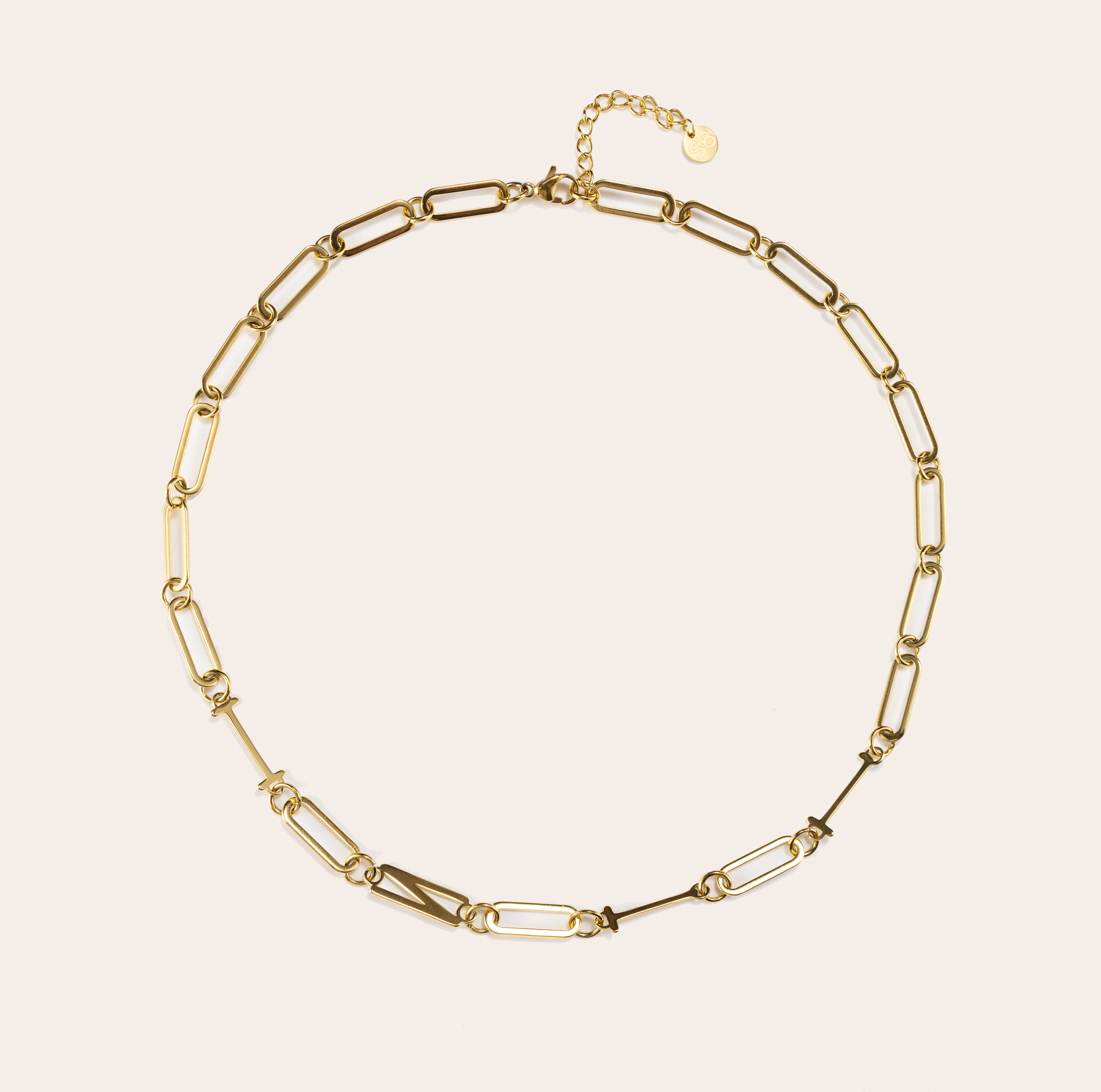 INTJ gold MBTI personality paperclip chain necklace displayed in a circular layout on a clean beige background, featuring minimalist link design and 18K gold finish.