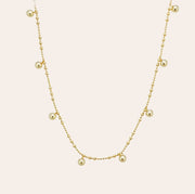 Lyric gold vermeil beaded necklace with floating round beads on a dainty chain, crafted in 14K gold vermeil over sterling silver, lightweight and layering-ready by SILVBREEZE