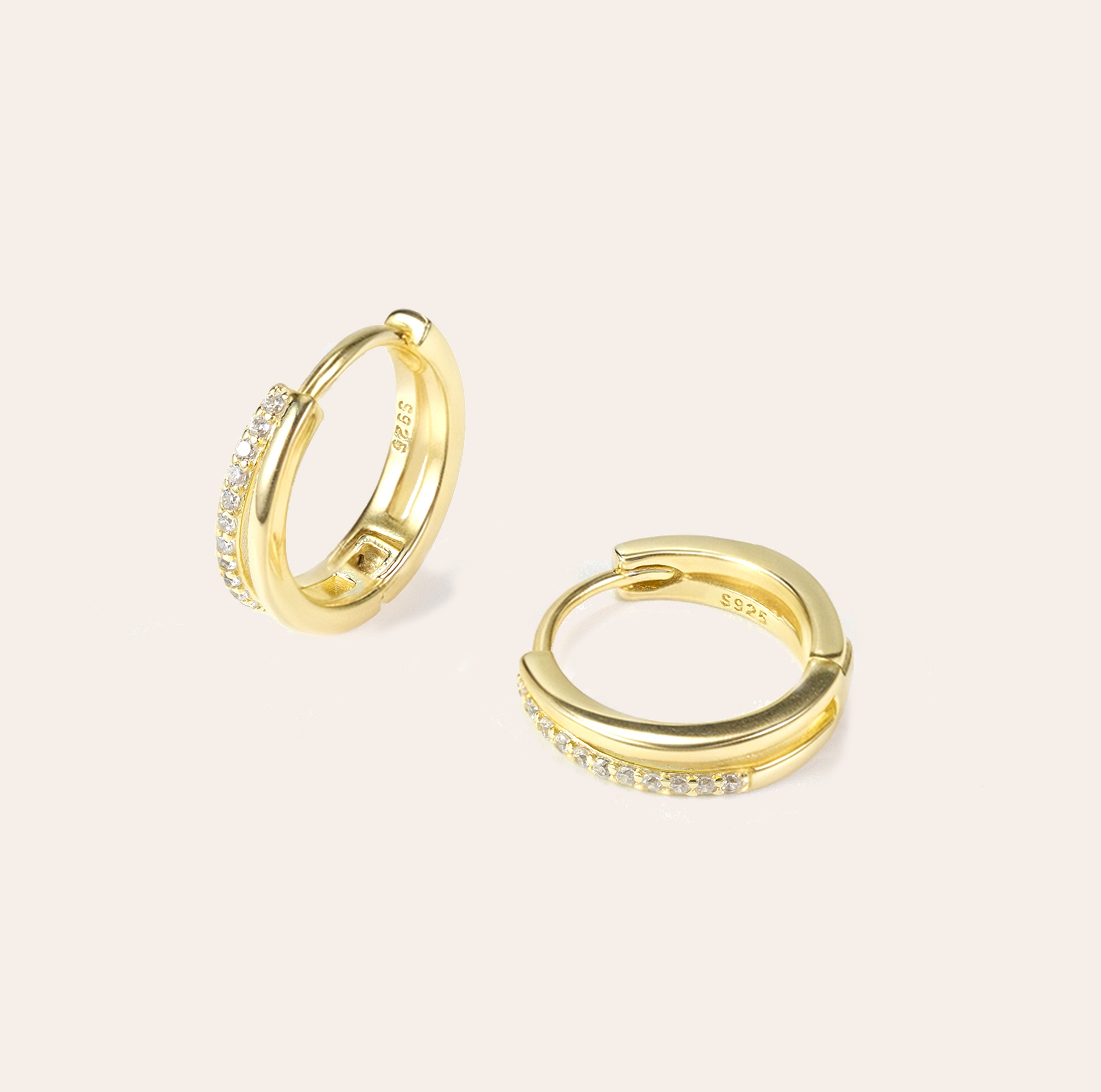 Nira gold huggie earrings in 14K gold vermeil with synthetic gemstones, lightweight and sweatproof design by SILVBREEZE