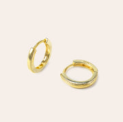 Onita gold huggie earrings in 14K gold vermeil with sculpted edge detailing, lightweight and sweatproof design by SILVBREEZE
