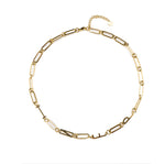 Waterproof gold INFP MBTI personality necklace with minimalist paperclip chain, tarnish-resistant stainless steel, displayed on a clean neutral background with 18K gold finish