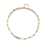 Waterproof gold INTJ MBTI personality necklace with minimalist paperclip chain, tarnish-resistant stainless steel, displayed on a clean neutral background with 18K gold finish