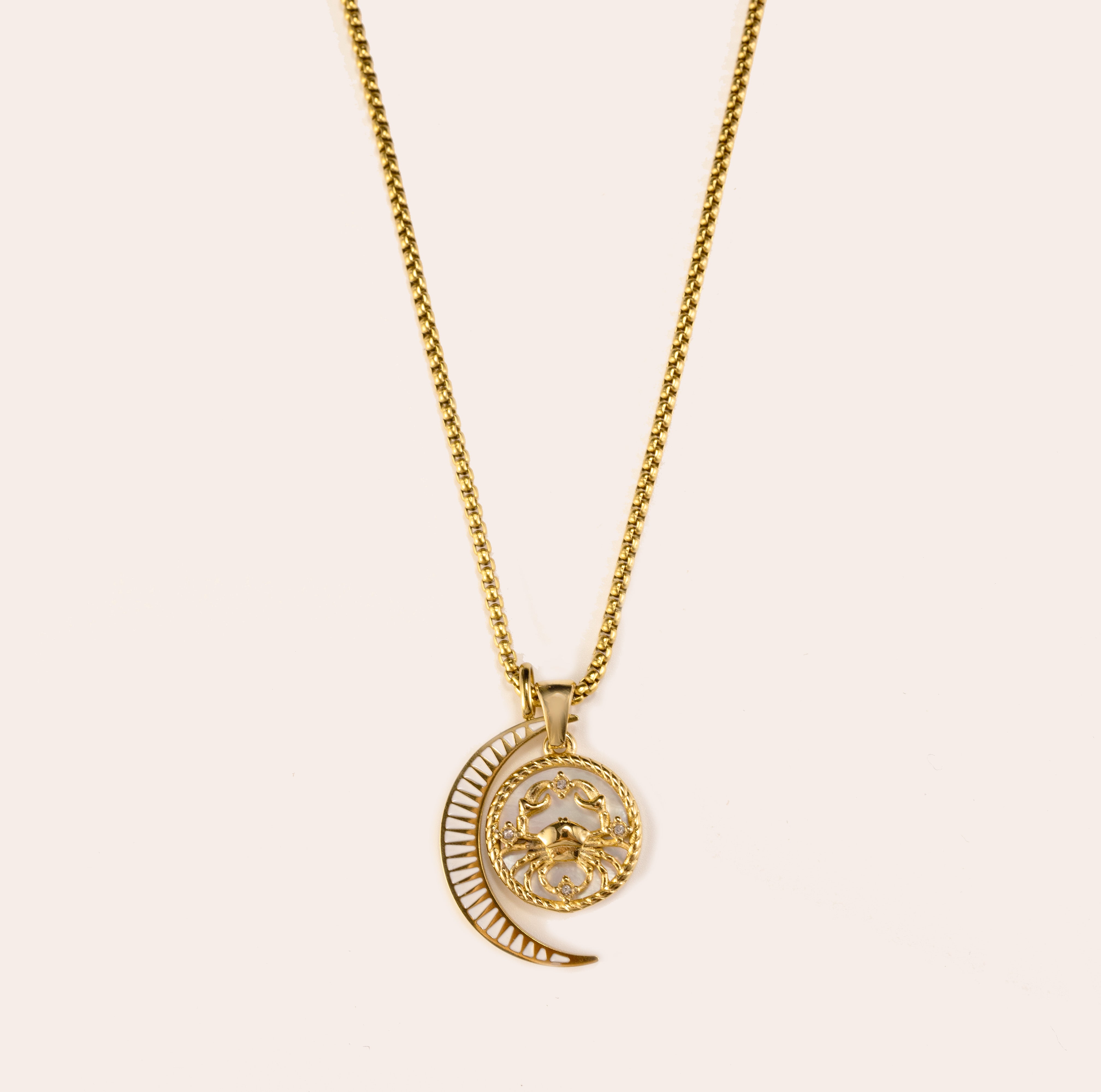 Silvbreeze Lunara Cancer zodiac necklace with a gold rounded box chain and moon mother-of-pearl charm on a clean neutral background.