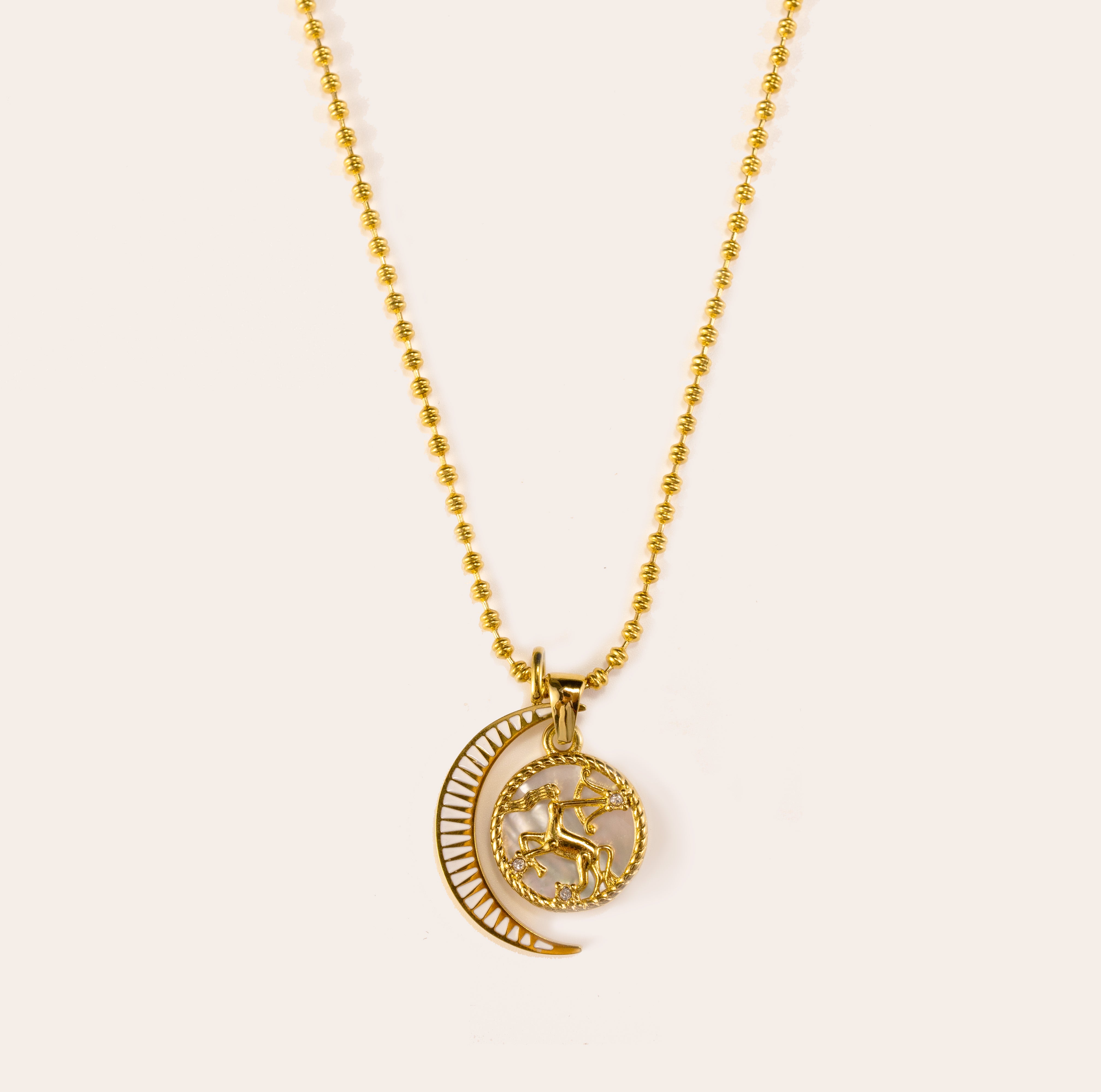 Silvbreeze Lunara Sagittarius zodiac necklace with bead chain and moon mother-of-pearl pendant on a clean white background.