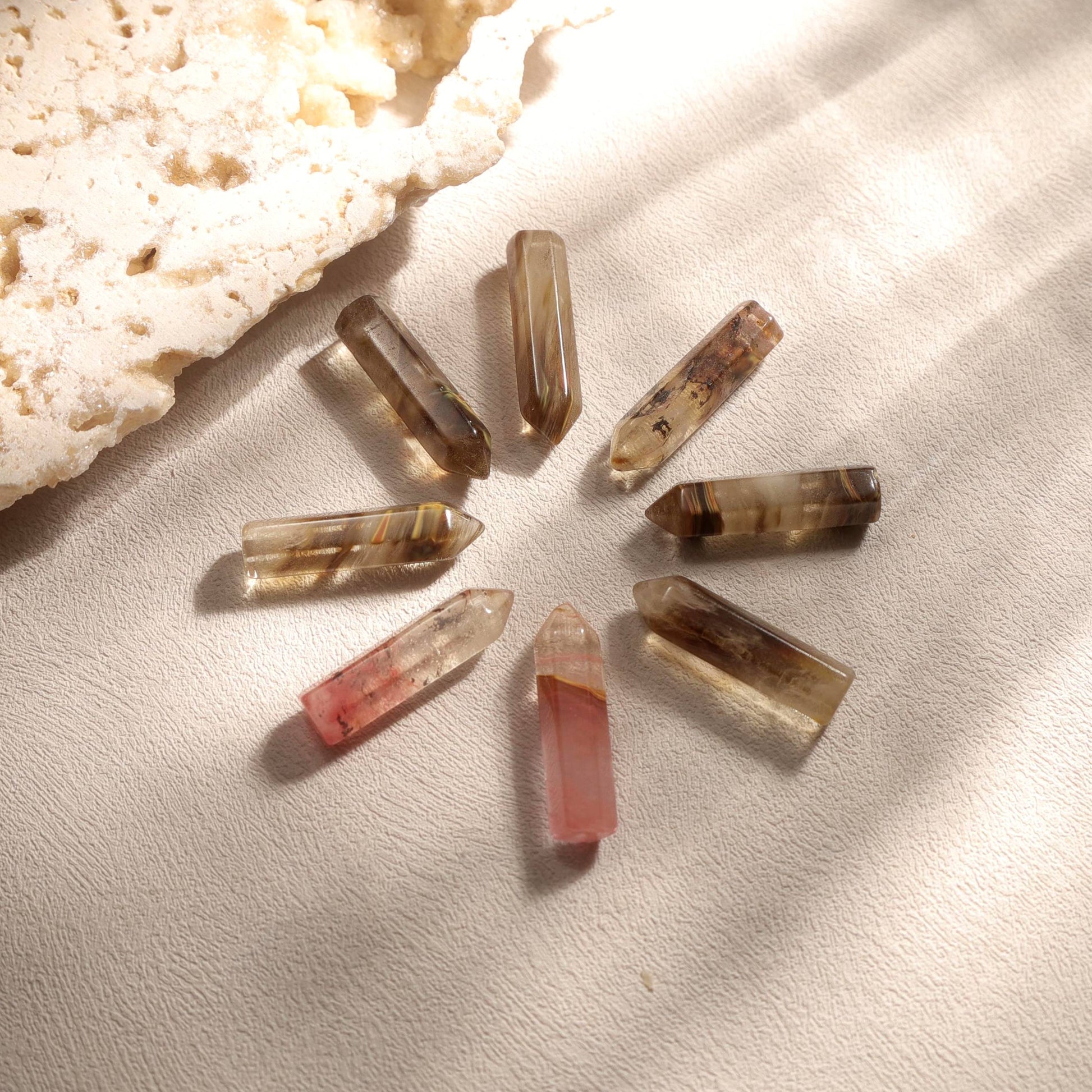 Natural refined tiger’s eye gemstones used in the Silvbreeze ouroboros serpent gemstone necklace, shown as raw polished stone details